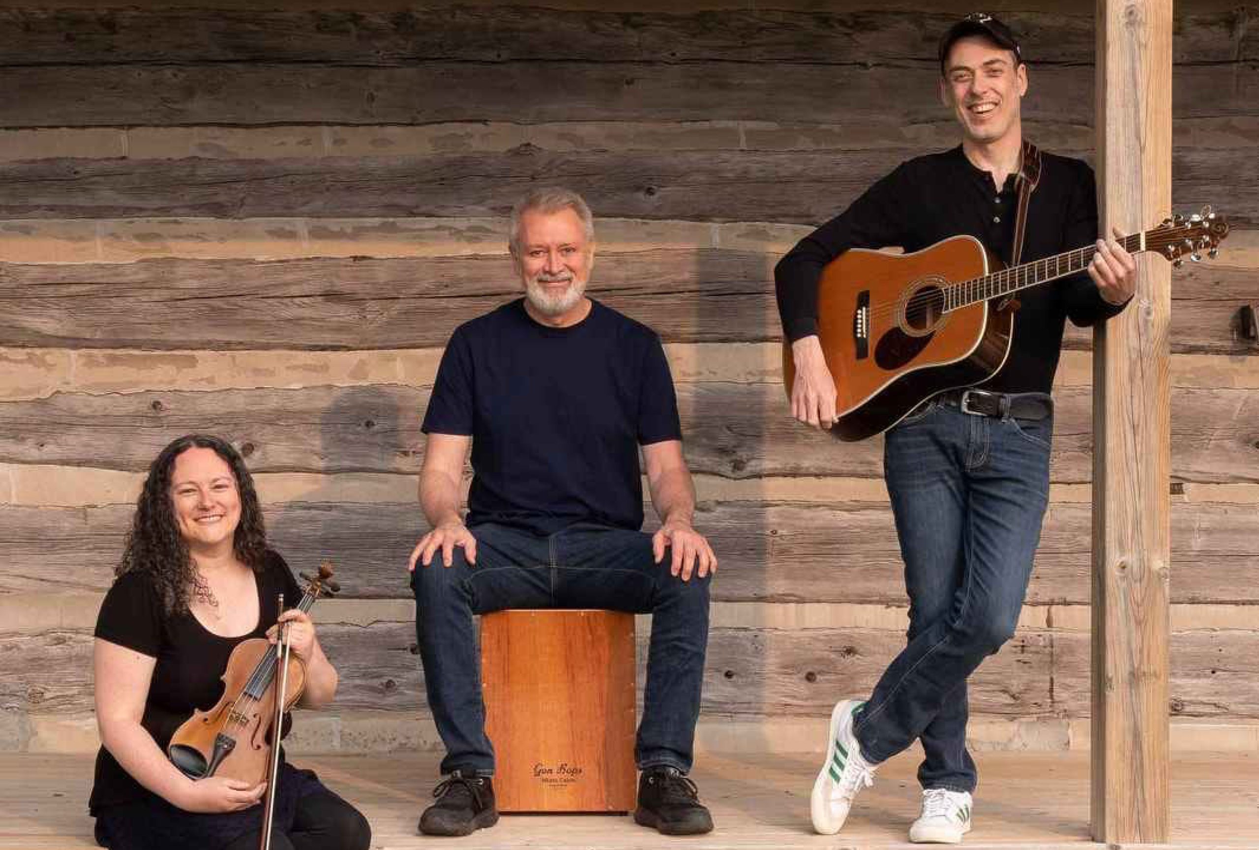 Image of the group Jellybean Blue with all three members holding instruments